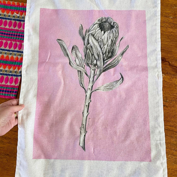 Pink Ice Protea art tea towel. Flower graphite drawing artwork on 100% cotton by local artist.